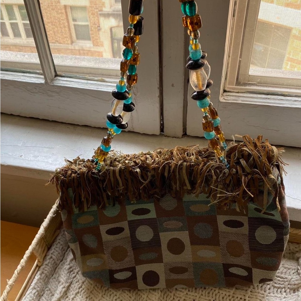 Pritz purse with beaded straps and fringed opening